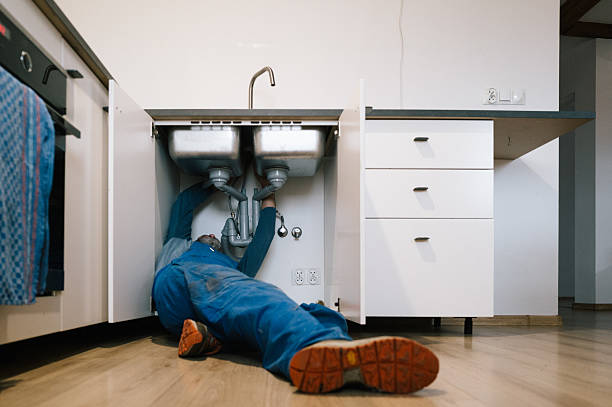 Professional Drain Cleaning technician working in Forest City, IA